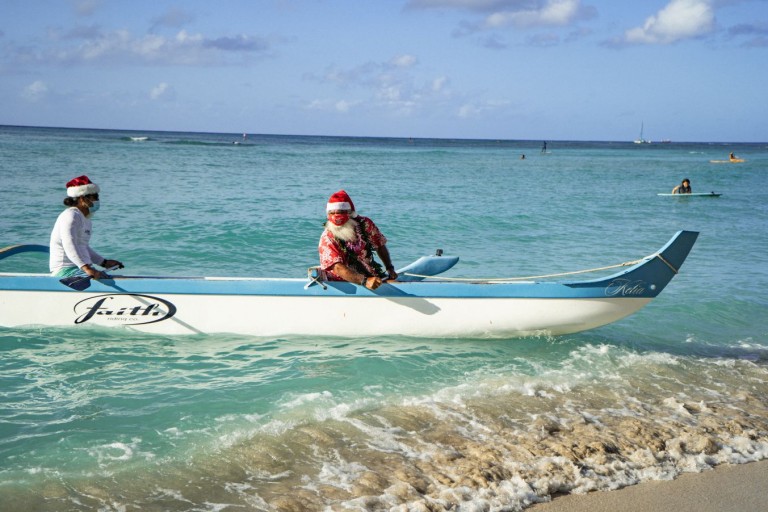santa in a canoe