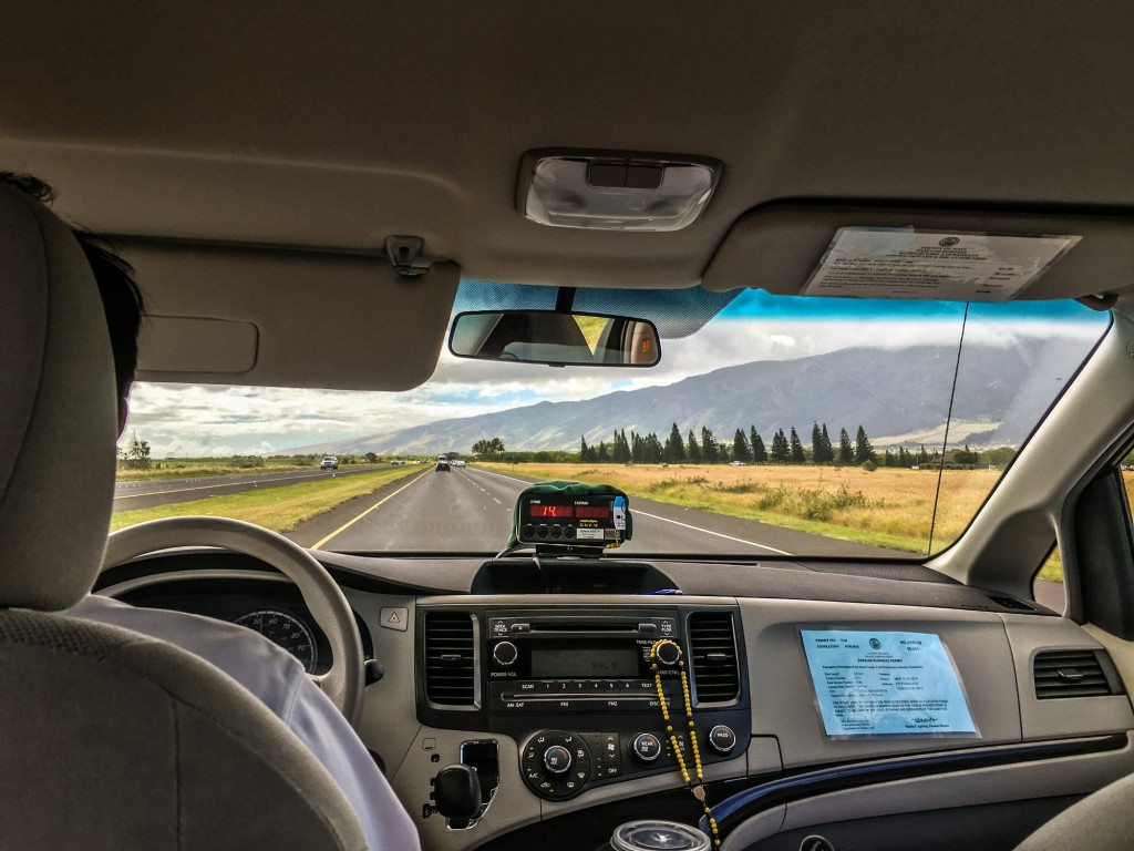 Taxi Driving On Maui Road, Hawaii, Usa
