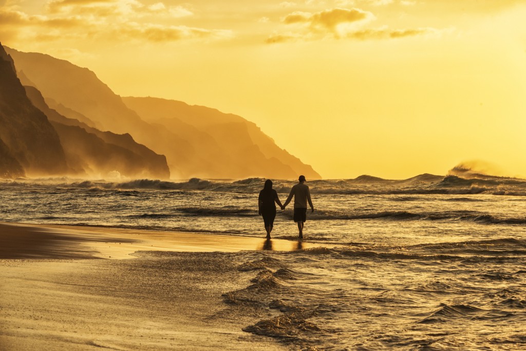 Couple Silhouette On Beach