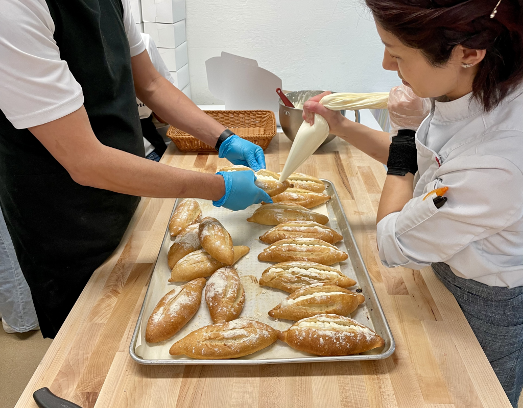 Nanako and Jimmy preparing mini baguettes