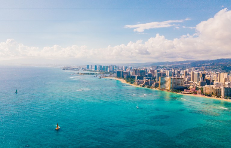 Diamond Head Volcano And Buildings On Waikiki Beach.