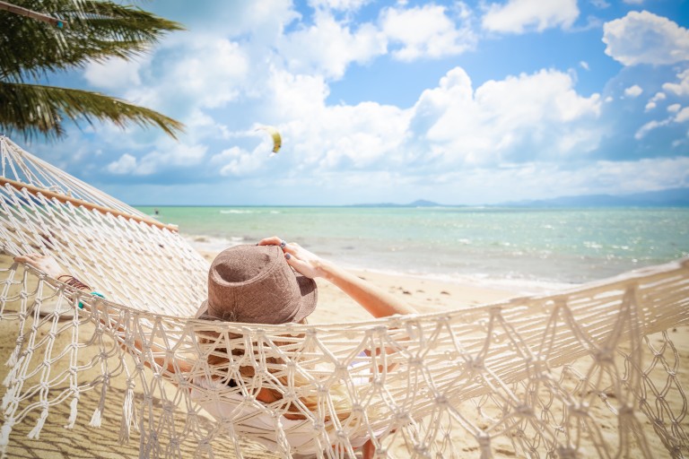 Woman On Hammock. Lifestyle Concept. Summer Vacation. Nature Concept. Summer Tourism, Travel.