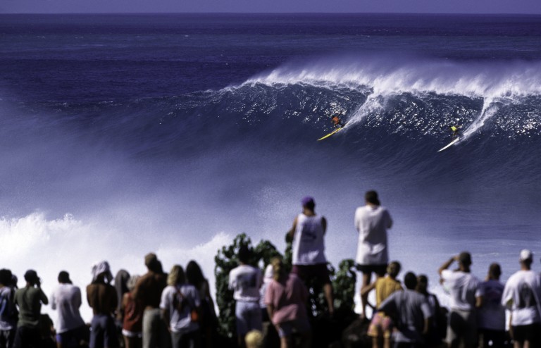 Surfers On North Shore Of Waimea Bay, Hawaii Oahu, Usa