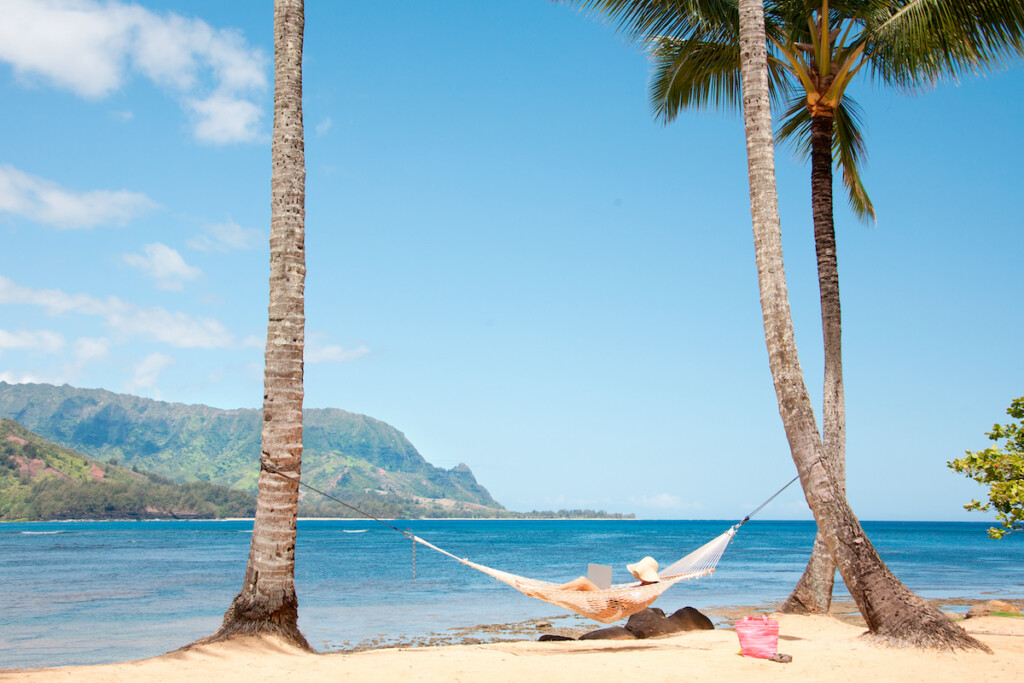 Woman Relaxing At Tropical Resort