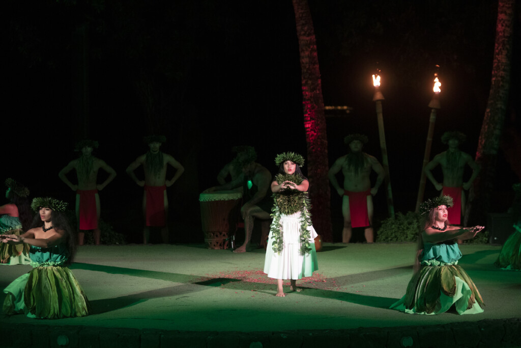 20240403 Old Lahaina Luau Ap 2023 Oll Woman In White With Green Lighting